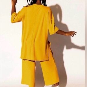 Dressed in LALA yellow playsuit